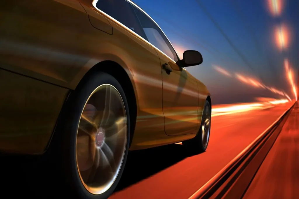 Voiture bronze en mouvement captée en contre-plongée, illustrant un modèle exposé au Salon automobile à Genève